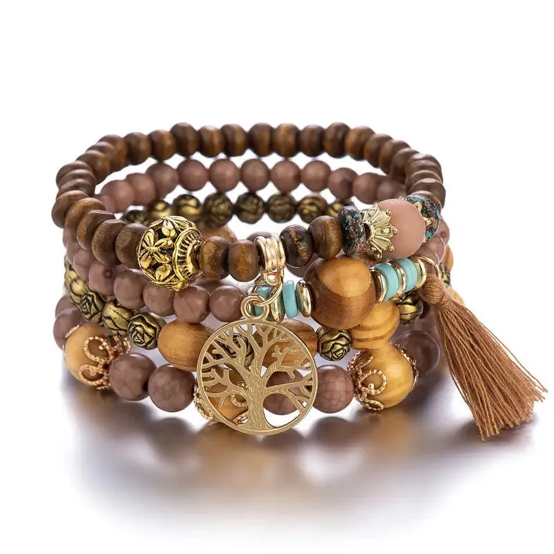 Add a touch of style with our Boho Bracelet Set: Handmade Wood Beads, Tree of Life Charms, Perfect for Bohemian Chic!