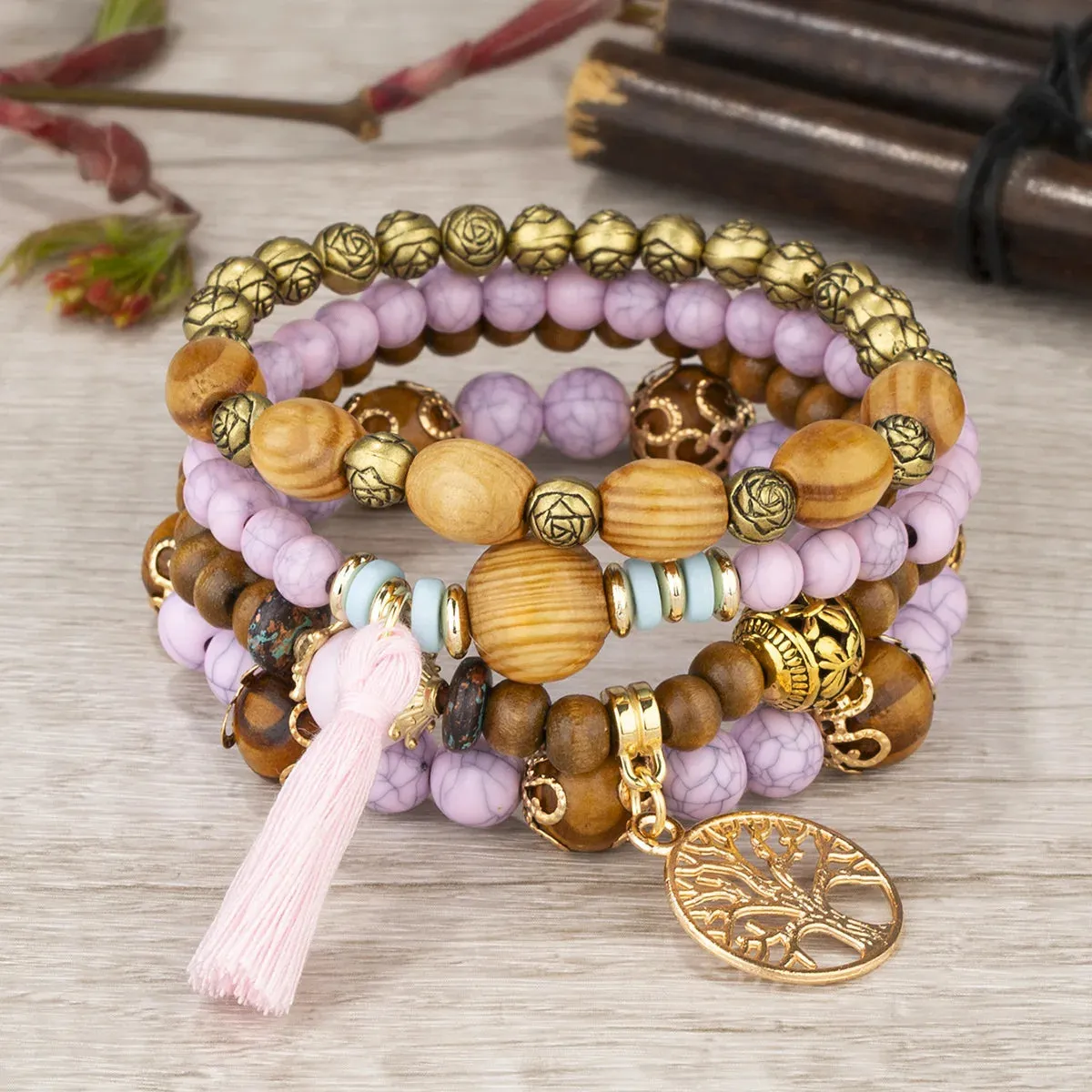 Add a touch of style with our Boho Bracelet Set: Handmade Wood Beads, Tree of Life Charms, Perfect for Bohemian Chic!