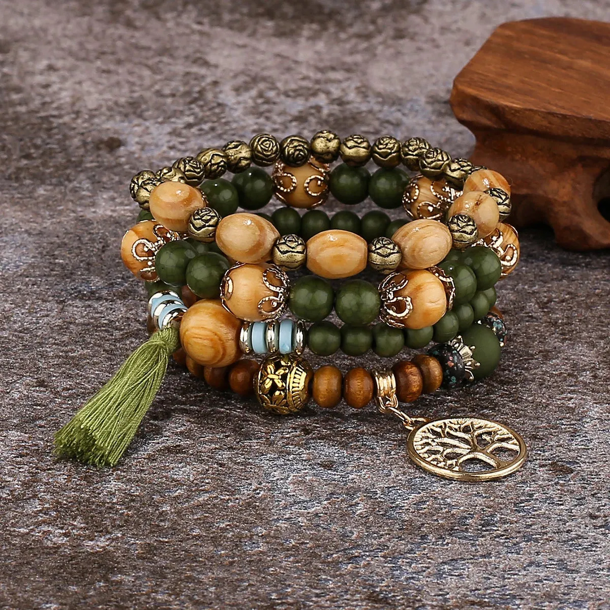 Add a touch of style with our Boho Bracelet Set: Handmade Wood Beads, Tree of Life Charms, Perfect for Bohemian Chic!