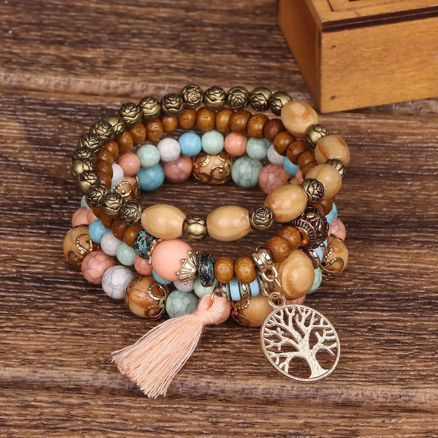 Add a touch of style with our Boho Bracelet Set: Handmade Wood Beads, Tree of Life Charms, Perfect for Bohemian Chic!