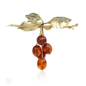 Retro gold cherry amber brooch